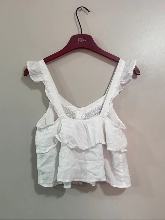 American Eagle white lace top with ruffles
Woman’s Size S - Picture 2 of 3